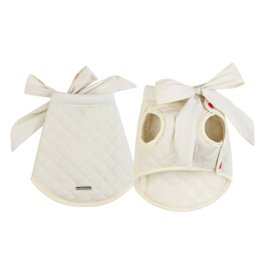 Two beige pet quilted shirt with bow ties on a white background